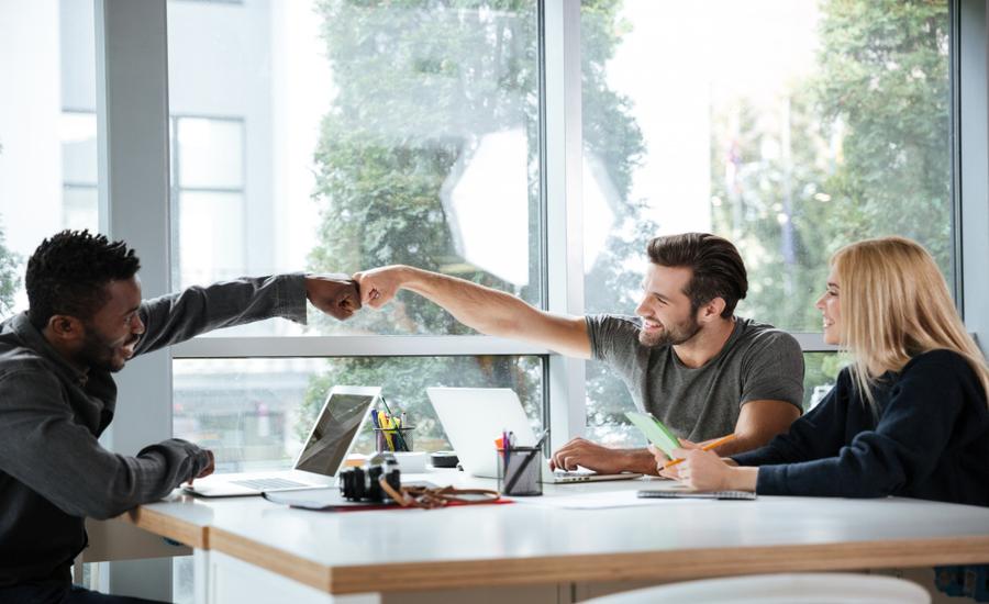 Symbolizing positive rapport and connection between manager-employee in the workplace.